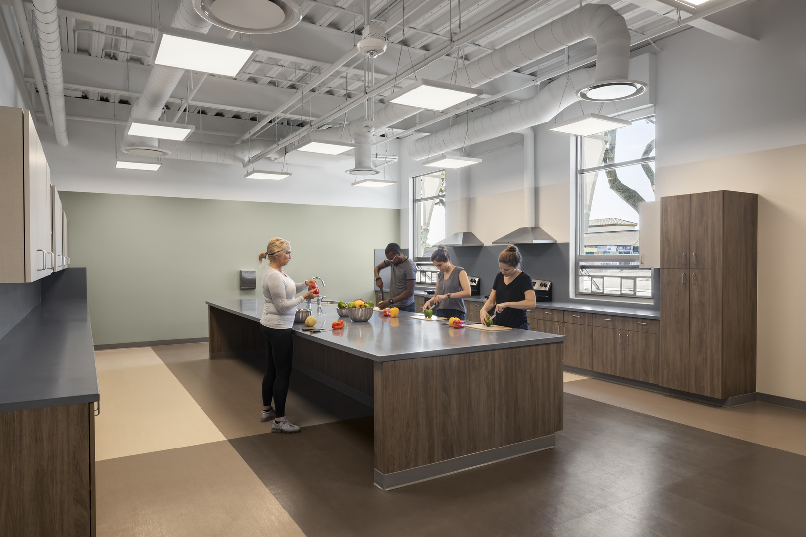 San Diego Live Well Health Center Kitchen Space uses wellness architecture design for its occupants.